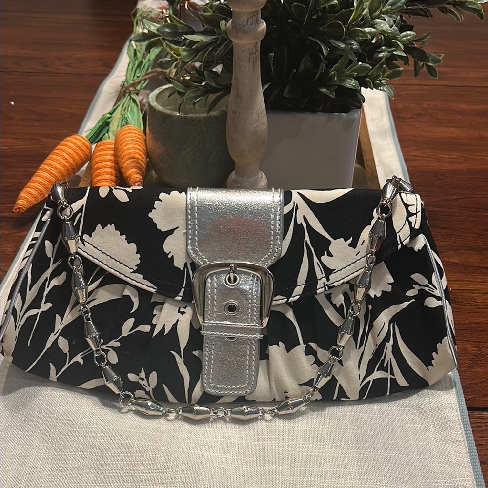 💥 2/$10 
White House Black Market Floral Black and White Clutch Silver Strap